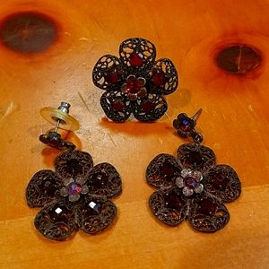 A set of earrings with matching ring